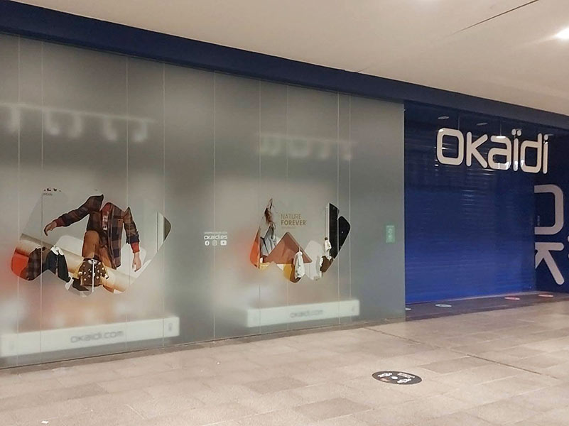 Storefront signage in shopping malls in Barcelona