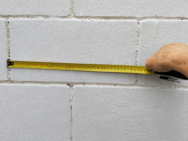 toma de medidas sobre el terreno antes de pintar